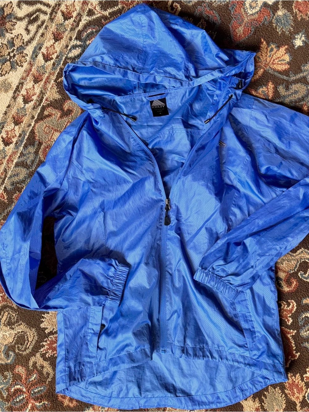 Kelty women’s M lightweight packable blue windbreaker, hooded water resistant